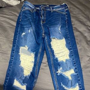 Distressed blue jeans. Smoke free home. NWT.